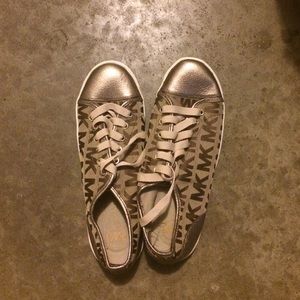 gold and brown Michael kors sneakers worn once