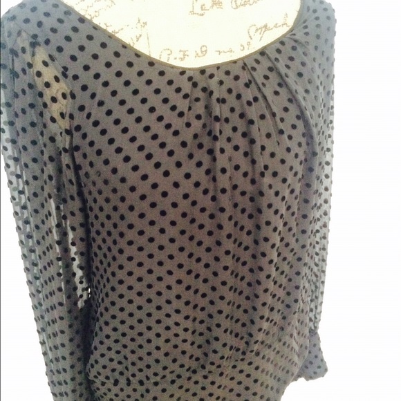 Black long sleeve polka dot silk top.