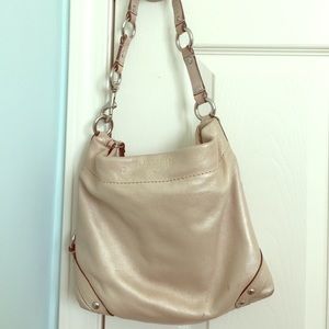 Authentic beige coach purse.