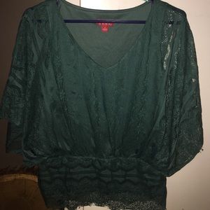 Lace turquoise big arm shirt.
