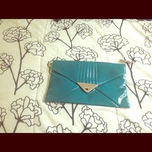 Pat & Leather clutch bag