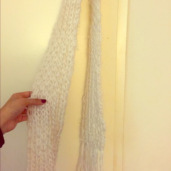 Medium length white knit scarf