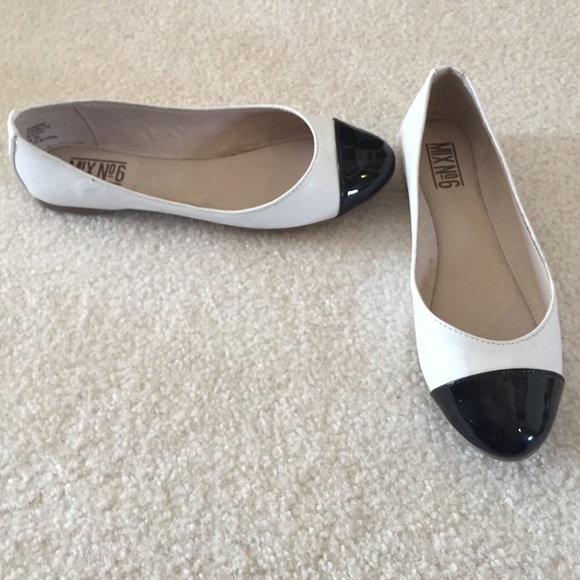 Black and white leather Flats