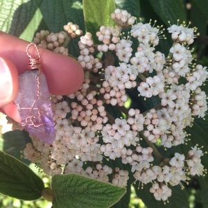 Raw amethyst crystal pendant