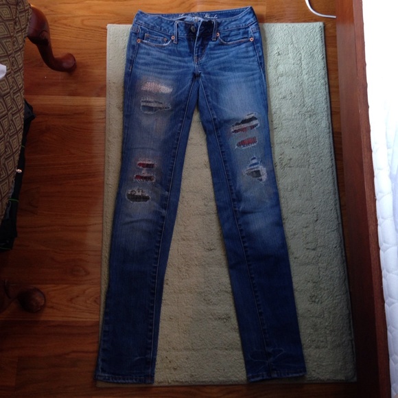 Destroyed patched jeans