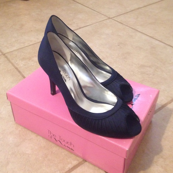 Blue satin peep toe pumps by The Touch of Nina