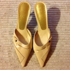 Light tan 7 1/2 slippers. BCBG