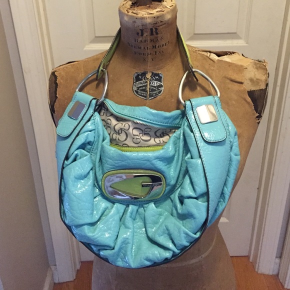 Teal and lime green Guess purse