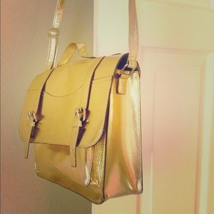 Metallic gold messenger bag