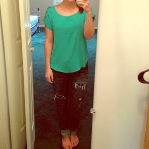 Teal blouse with gold decoration on sleeve