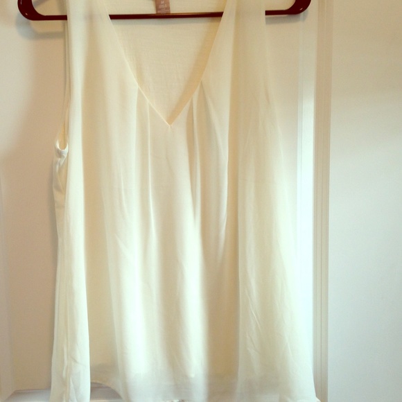 Cream Flowy tank.
