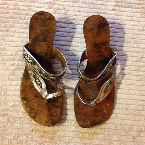 Gold Crystal sandals size 7.