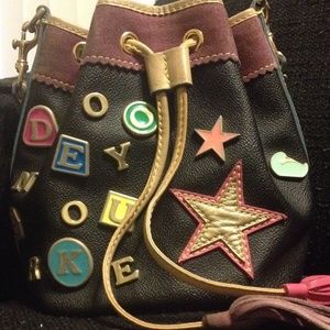 Authentic Dooney and Bourke drawstring handbag