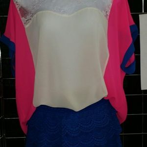 Colorful shirt with blue lace shorts