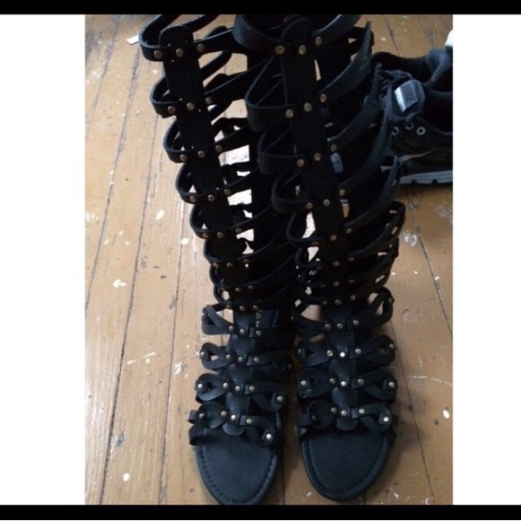 Gold and black gladiator sandals