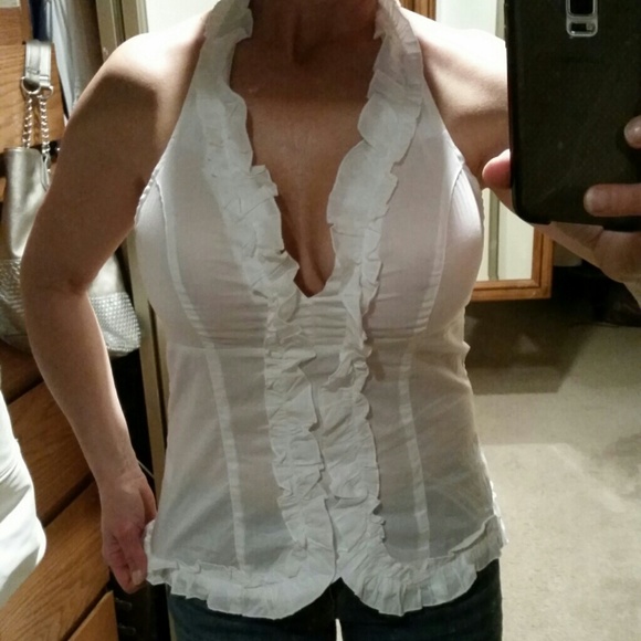 White ruffle trimmed hater top.