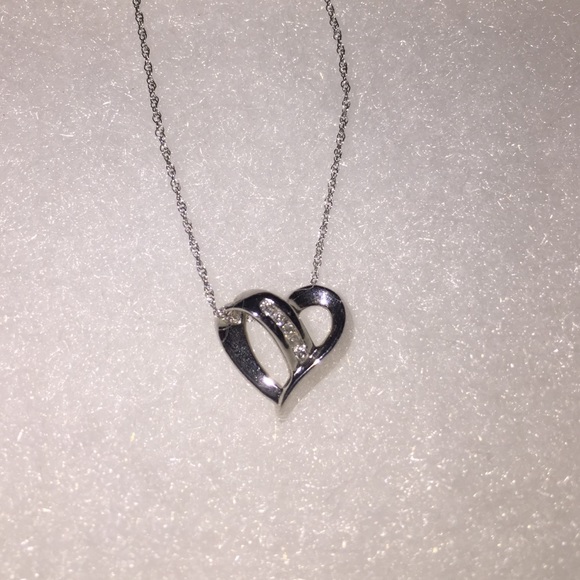 Diamond heart shaped pendant in sterling silver