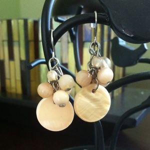 Peach earrings.