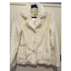 White faux fur coat