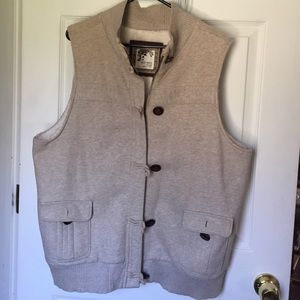 Vest zip/button up 2  pockets.