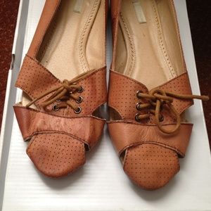 Brown leather flats