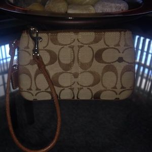 Tan Coach  wristlet