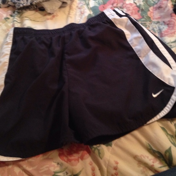 navy blue and white nike running shorts