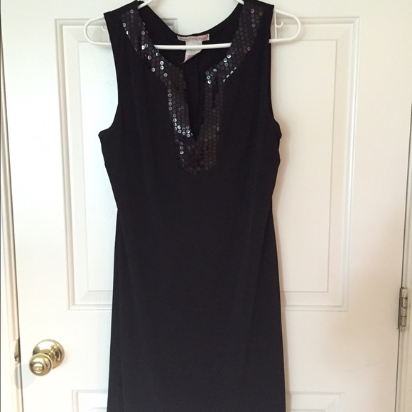 Black dress with glittery work At the neck