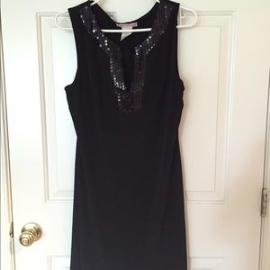 Black dress with glittery work At the neck