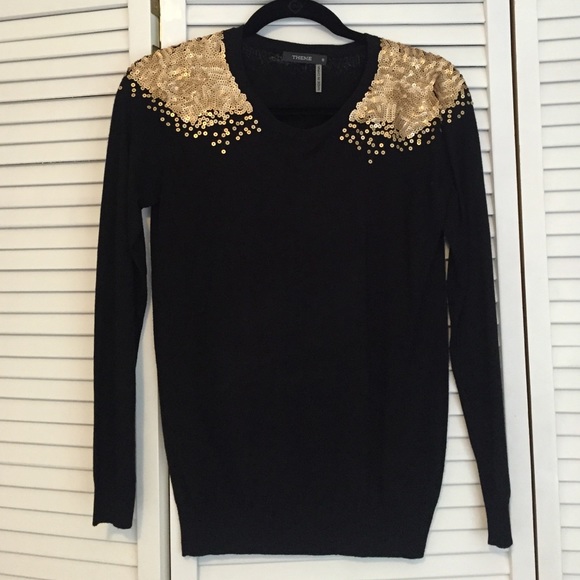 Sequin shoulder sweater.