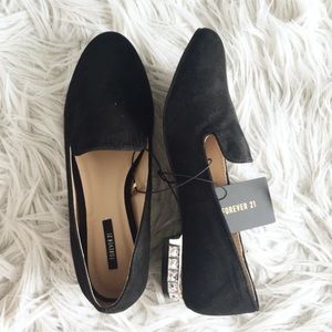 Clear jeweled heel black suede flats