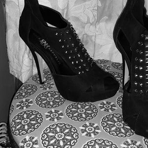 Black studded pumps