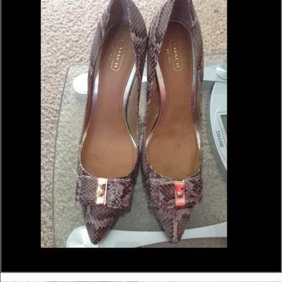 Coach brand new.  Heel is 4"