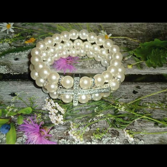 Handcrafted triple strand beaded cross bracelet