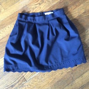 Navy mini skirt with scallop trim BCBG