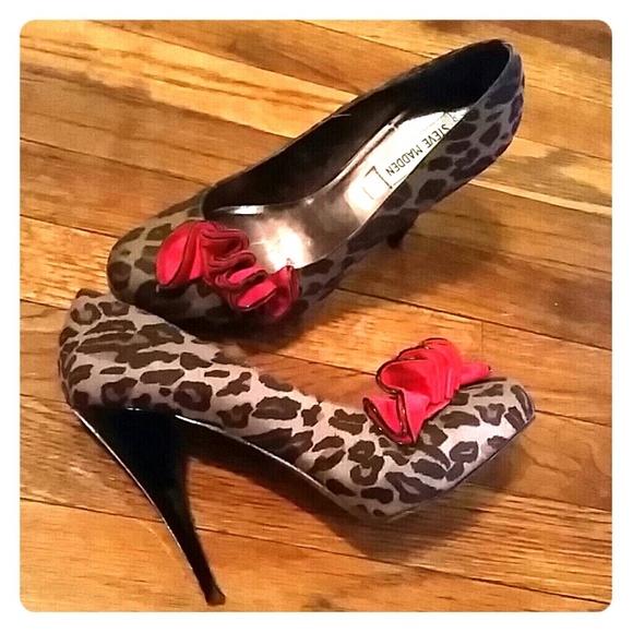 Steve Madden leopard print pumps w/ ruffle detail.