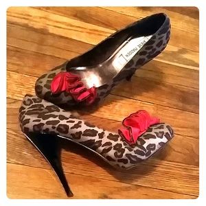 Steve Madden leopard print pumps w/ ruffle detail.