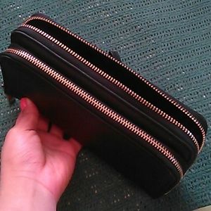 black double zipped wallet.