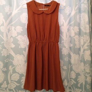 Dark orange with Black spot dress.