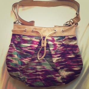 Tan leather, purple and teal handbag