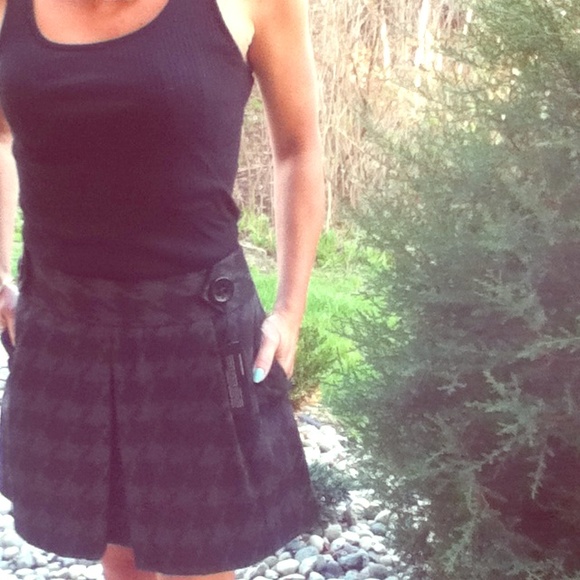 A black checkered skirt with pockets