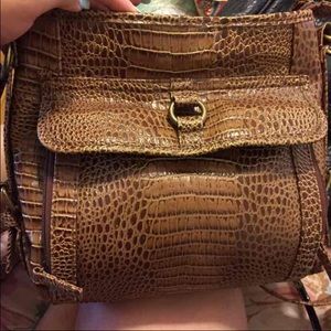 Textured brown cross body bag.
