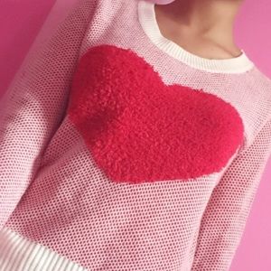 Cream and red Sweater with heart.