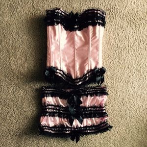 Pink and black boustier and skirt