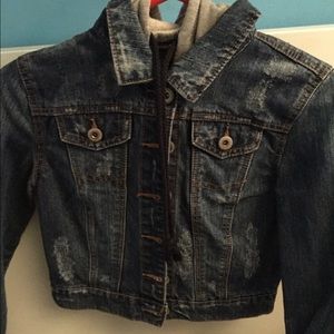 Small cute jean jacket with a hood.