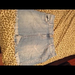 Light jeans skirt with sparkles