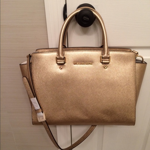 gold michael kors purse