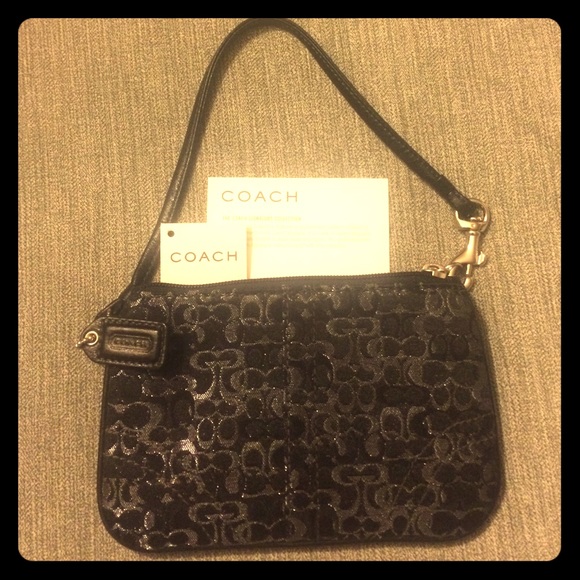 Coach wristlet in black and silver