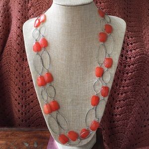 Very 60's long orange and silver hippie necklace