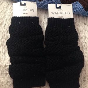 Black leg warmers still in package